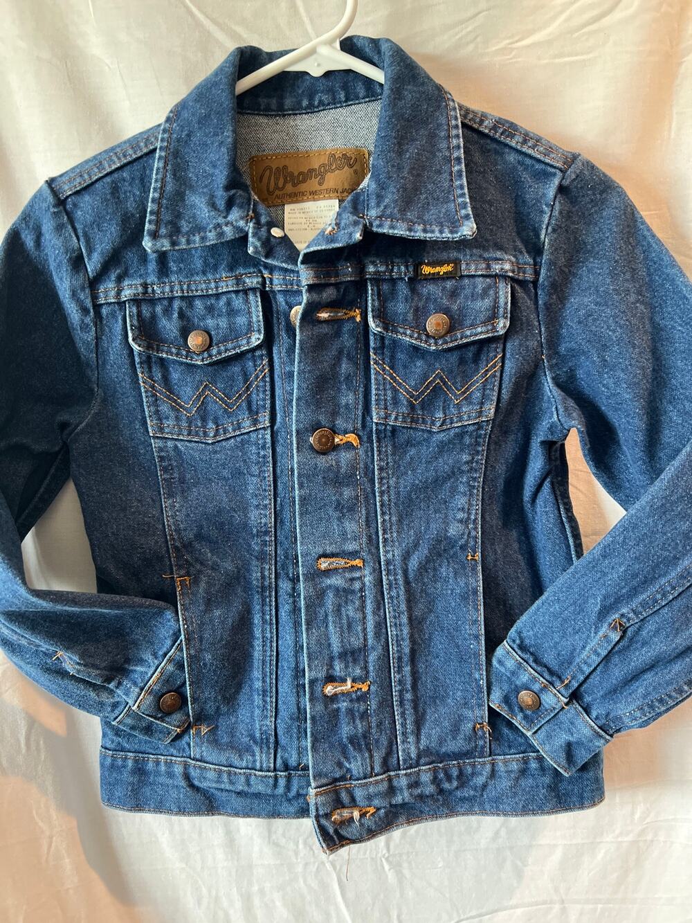 Wrangler boys medium unlined denim jacket.